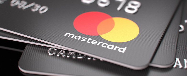 A stack of Mastercard brand credit cards